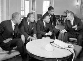 U.S. President Lyndon B. Johnson, right, talks with civil rights leaders in his White House office in Washington, D.C., Jan. 18, 1964.  The black leaders, from left, are, Roy Wilkins, executive secretary of the National Association for the Advancement of Colored People (NAACP); James Farmer, national director of the Committee on Racial Equality; Dr. Martin Luther King Jr., head of the Southern Christian Leadership Conference; and Whitney Young, executive director of the Urban League.  (AP Photo)